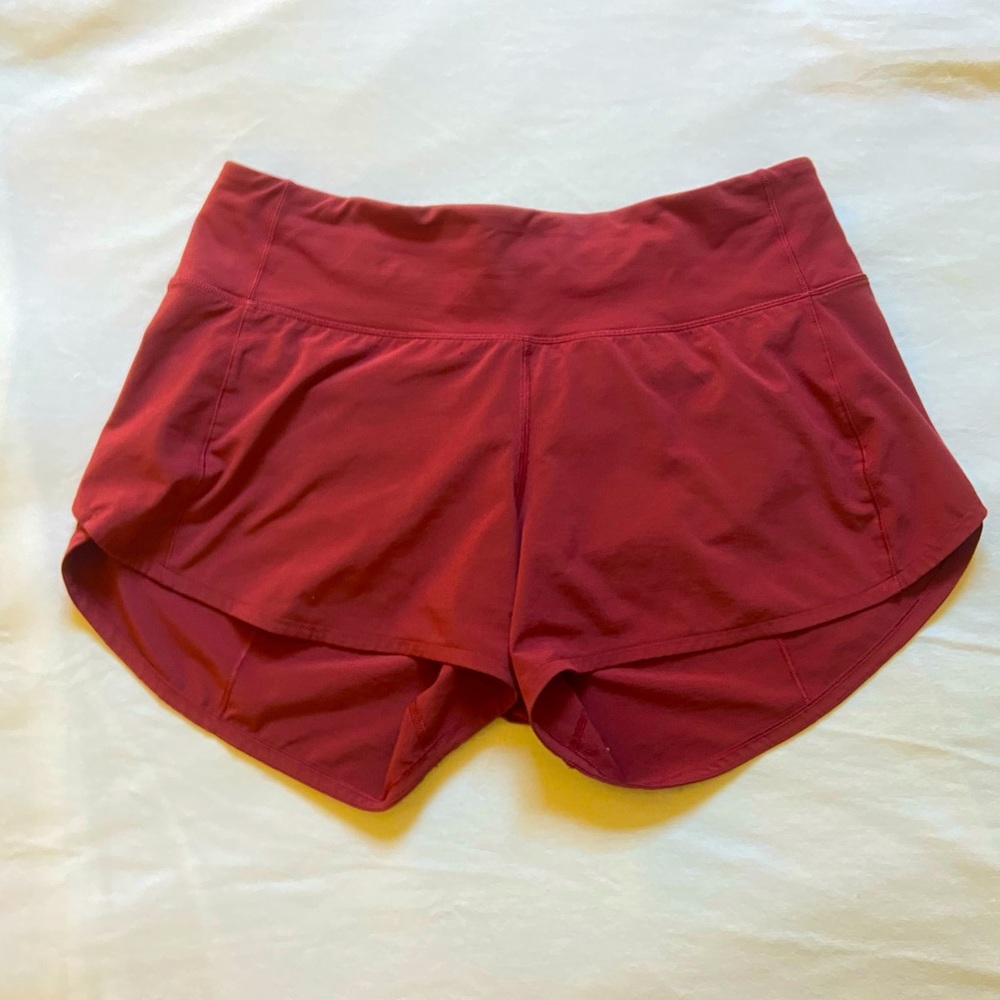 Burgundy lululemon Speed Up Shorts, size 6